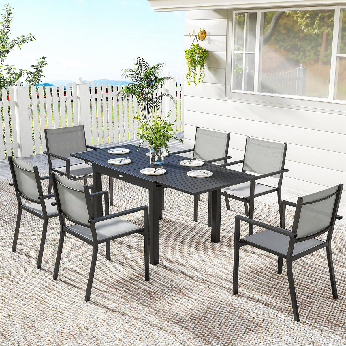 Ensemble repas extérieur 7 pièces avec table extensible et chaises empilables