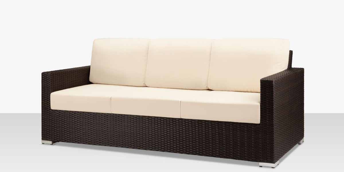 Lucaya – Canapé Espresso avec coussin Standard Off-White